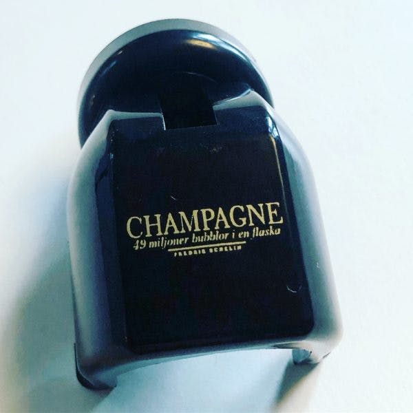 Champagnestopper svart